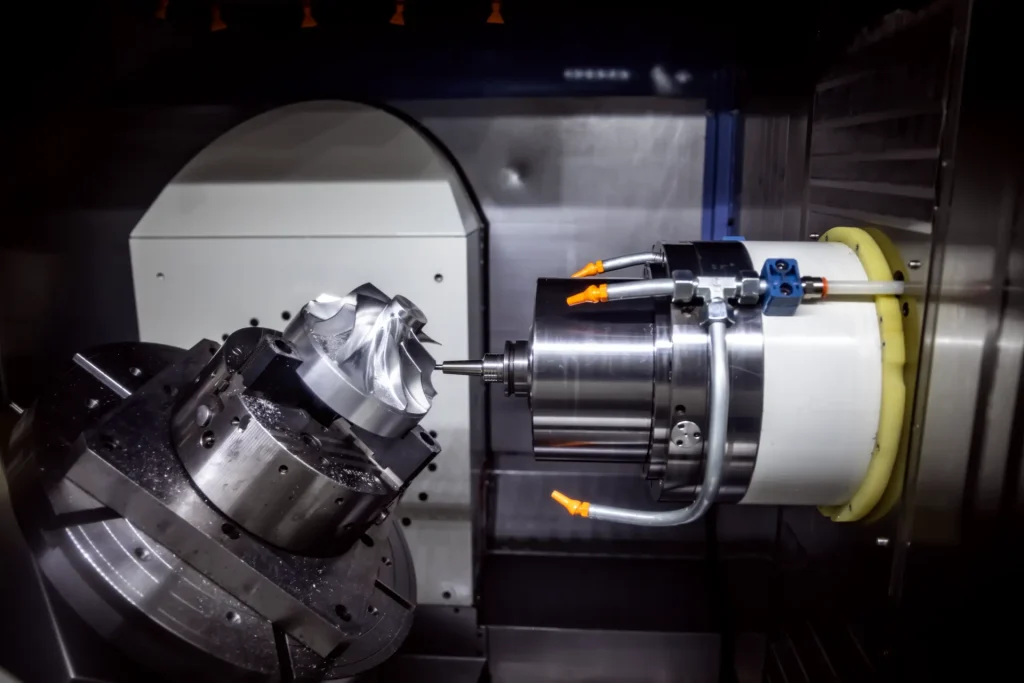 CNC milling machine operating in a precision machining 