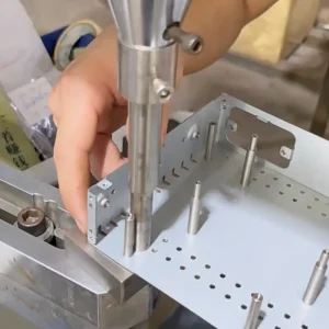 pneumatic poprivet station with operator loading mandrels