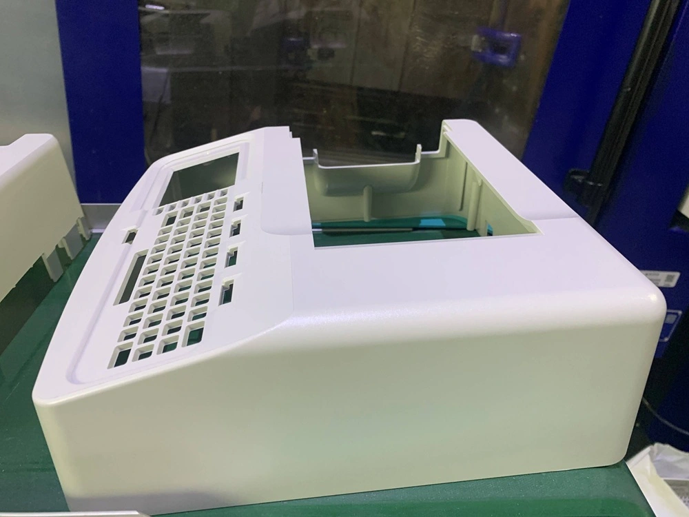 Polycarbonate injection molded electronics enclosure with intricate thin-wall design