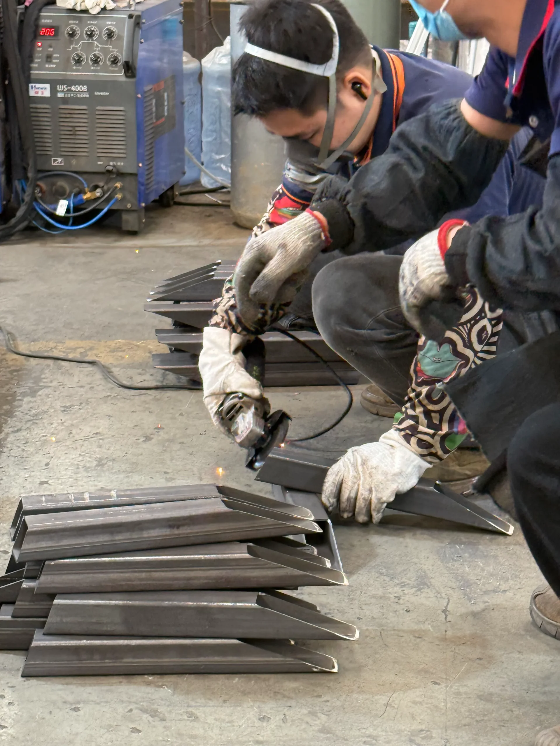 Close-up of precision laser welding on thin sheet metal showing minimal heat-affected zone