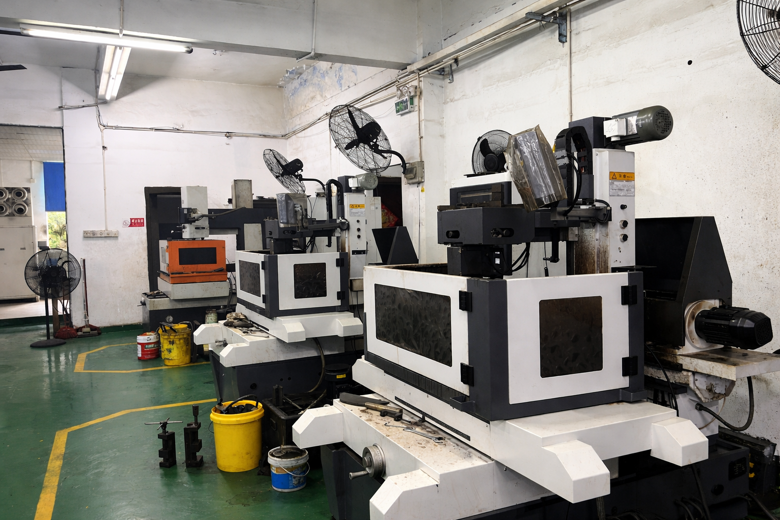 Wire EDM machining process in precision workshop