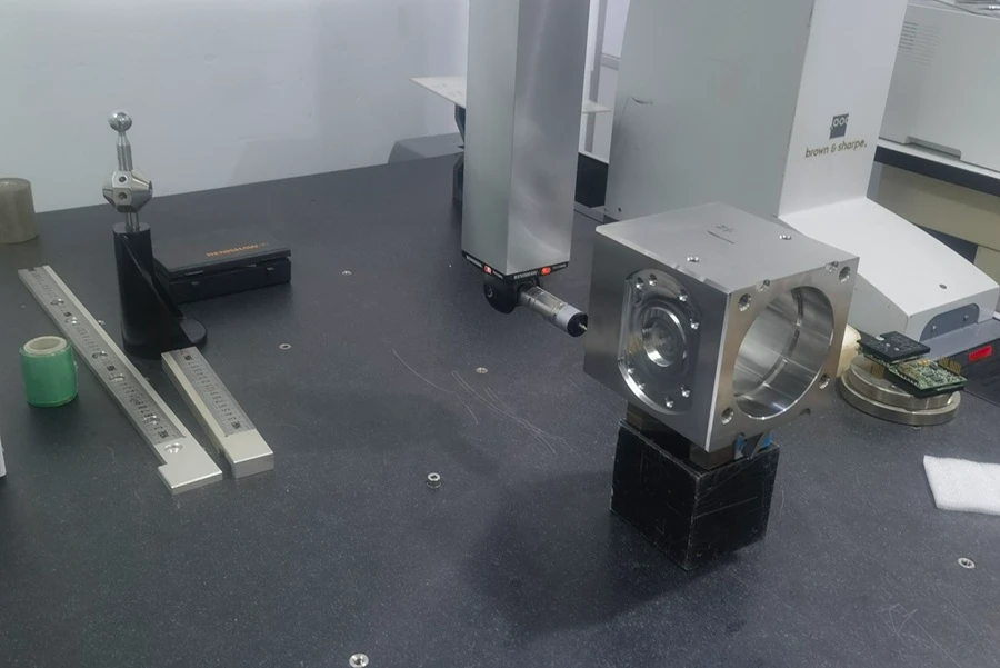 CMM inspection of a tightly toleranced Invar 36 machined part to guarantee absolute dimensional permanence