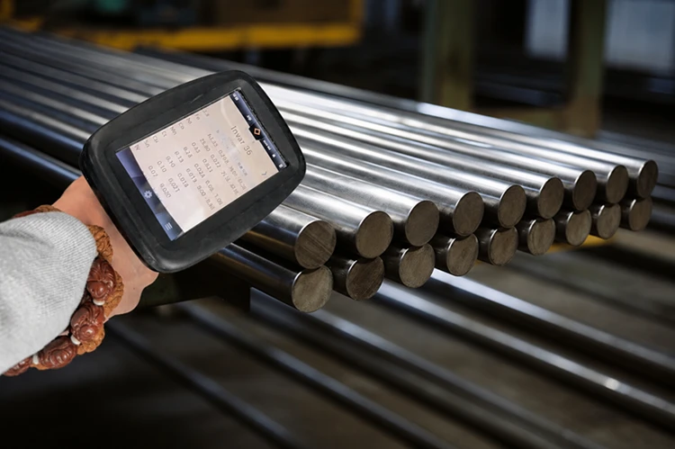 Raw Invar 36 round bar stock material ready for precision CNC machining