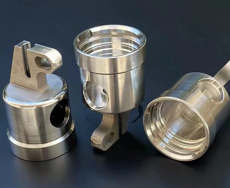 Complex Swiss machined part featuring fine threads, cross holes, and milled flats completed in one setup
