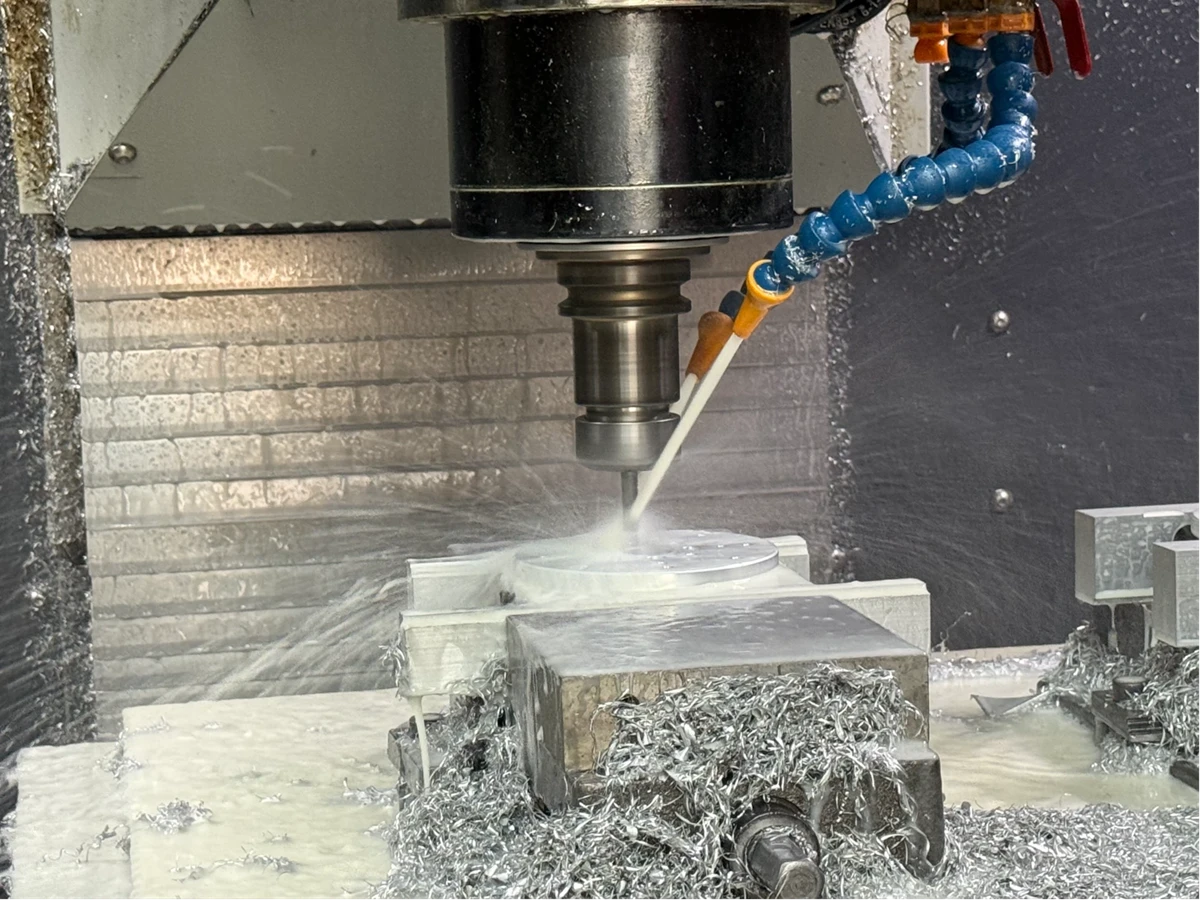 precision CNC machined aluminum component under automated inspection