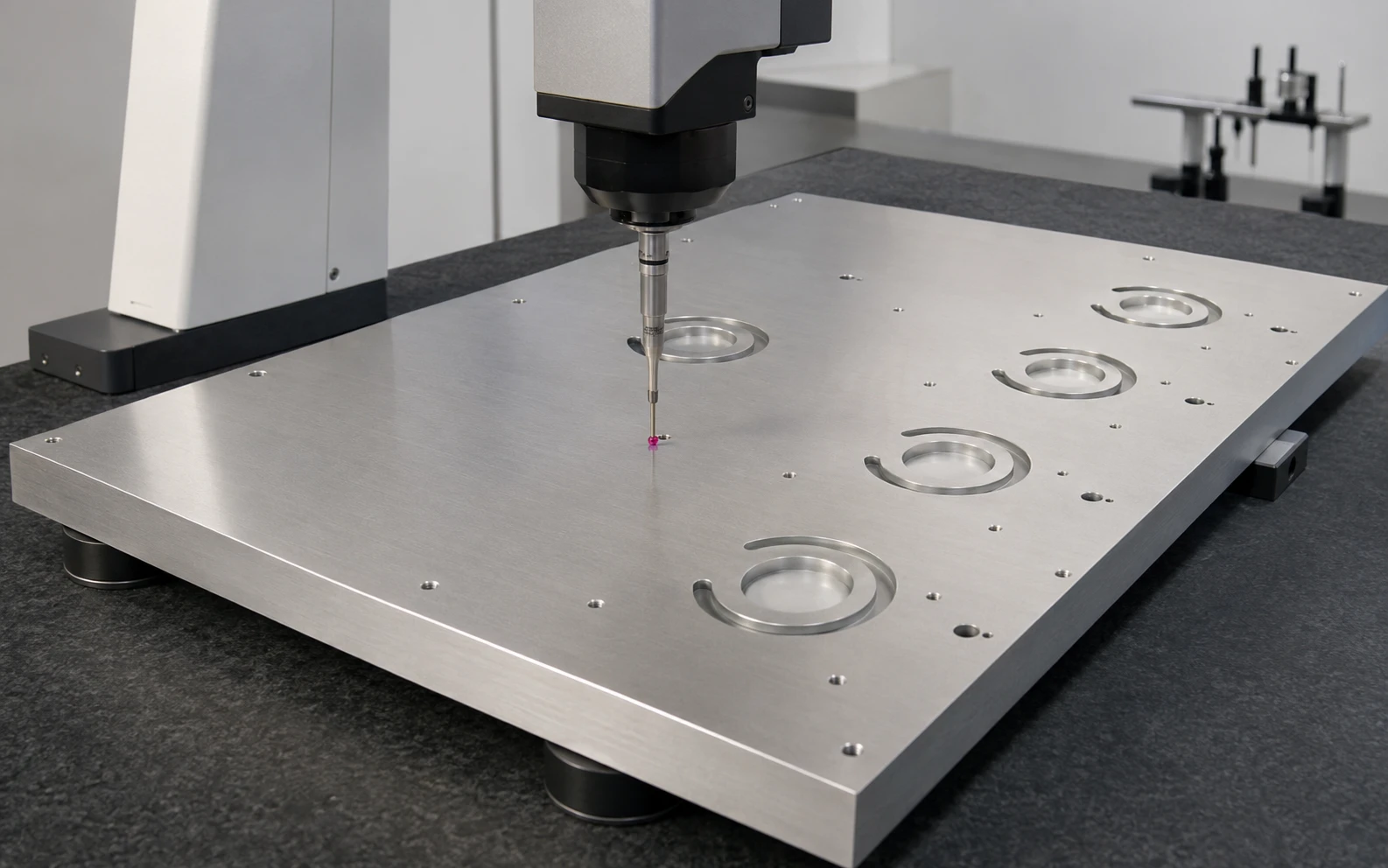 CMM inspection of a machined aluminum baseplate
