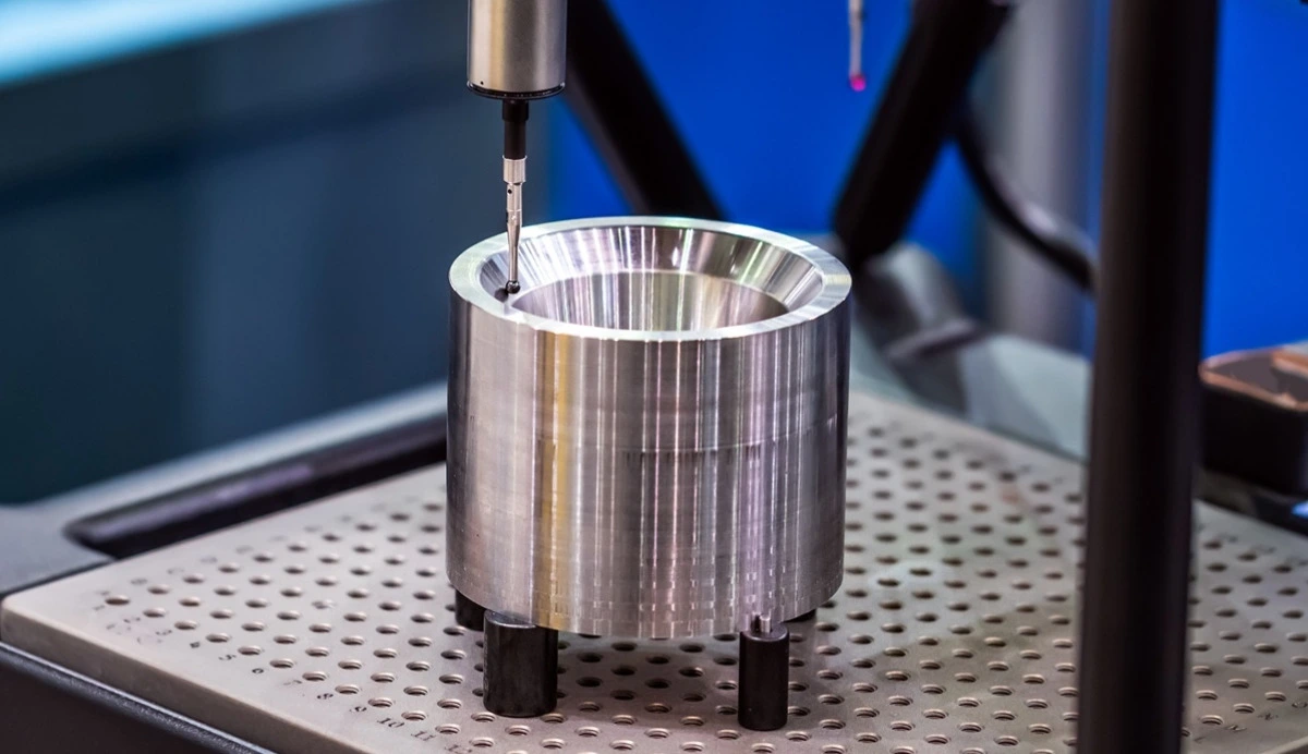 CMM probe measuring a precision machined bore