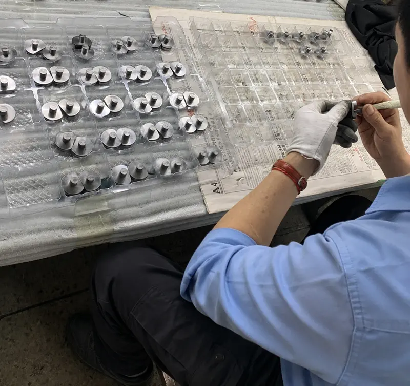 Deburring CNC machined metal components