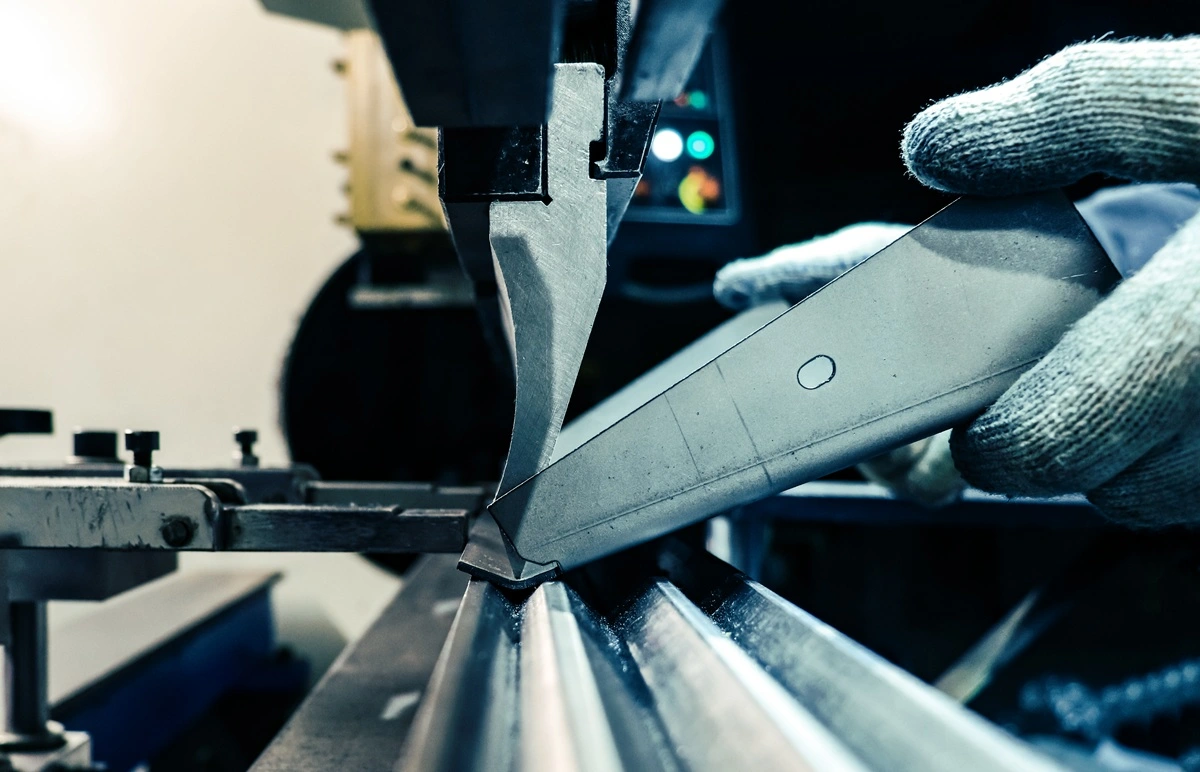 Press brake bending a steel sheet