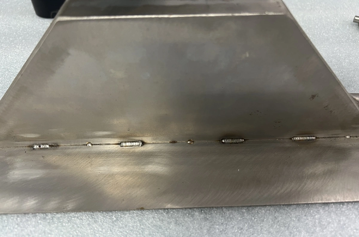 Sheet metal tack weld fit-up control