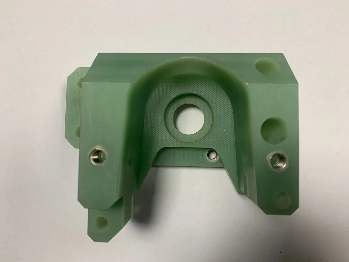 Annular G10 Housings With Metal Threaded Inserts