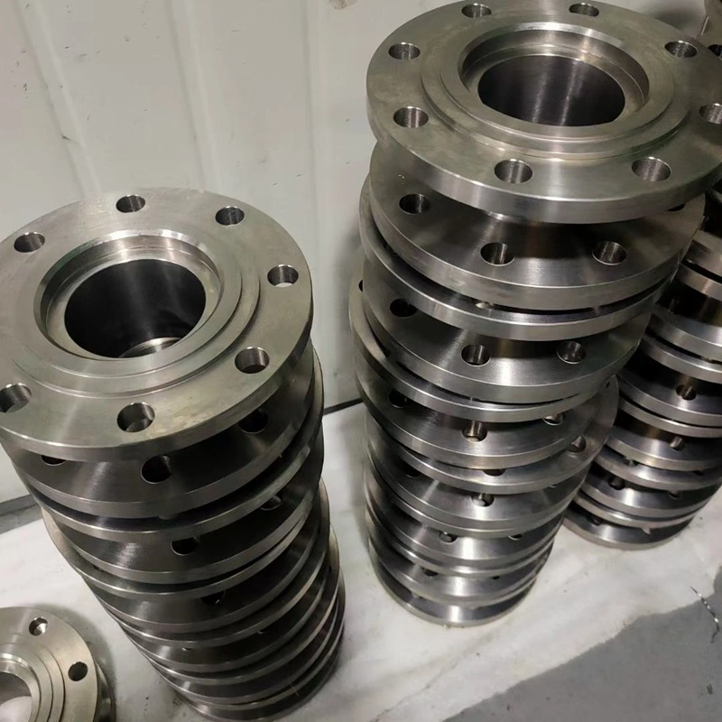 Batch of CNC-machined titanium flanges