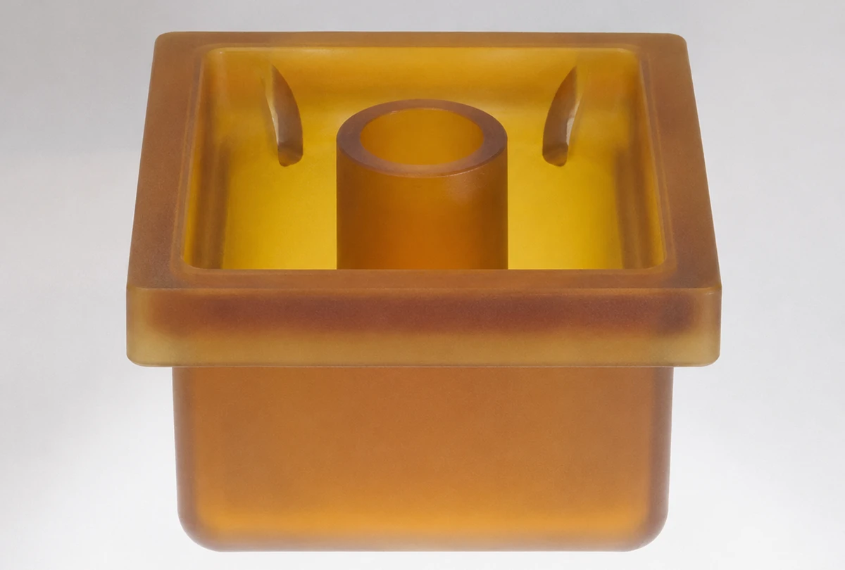 CNC machined PEI housing with central boss for high temperature electrical and instrumentation applications
