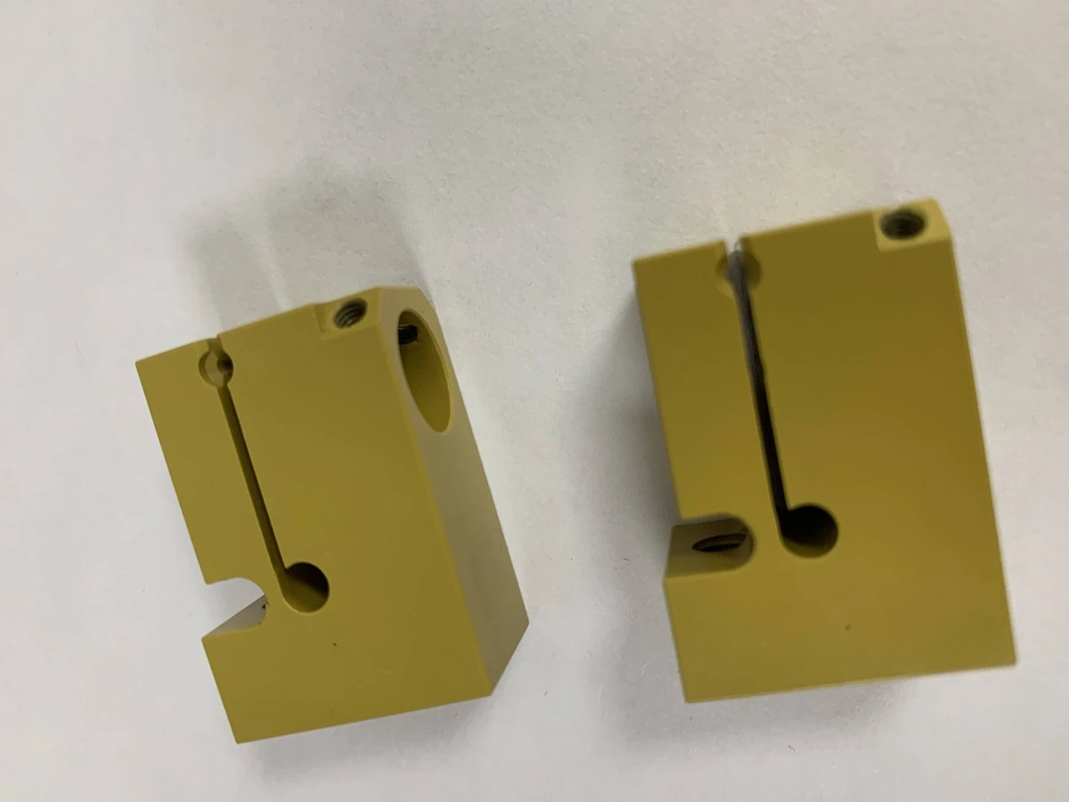 CNC machined Torlon PAI 4203 Bragg clamp