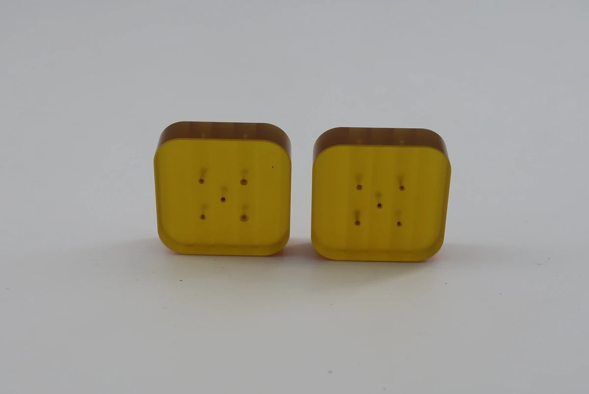 CNC machined amber PEI precision plastic components