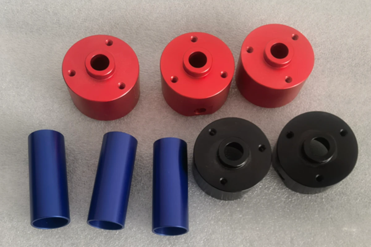 Color anodized CNC machined aluminum parts with red blue and black finishes