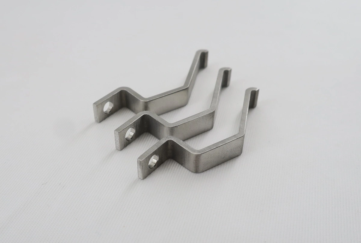 Formed stainless steel brackets requiring repeatable bend geometry and clean mounting holes.