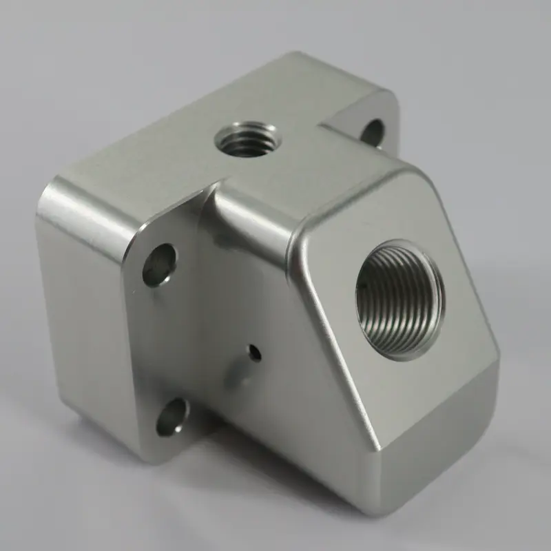 Internal threads in a CNC machined metal block