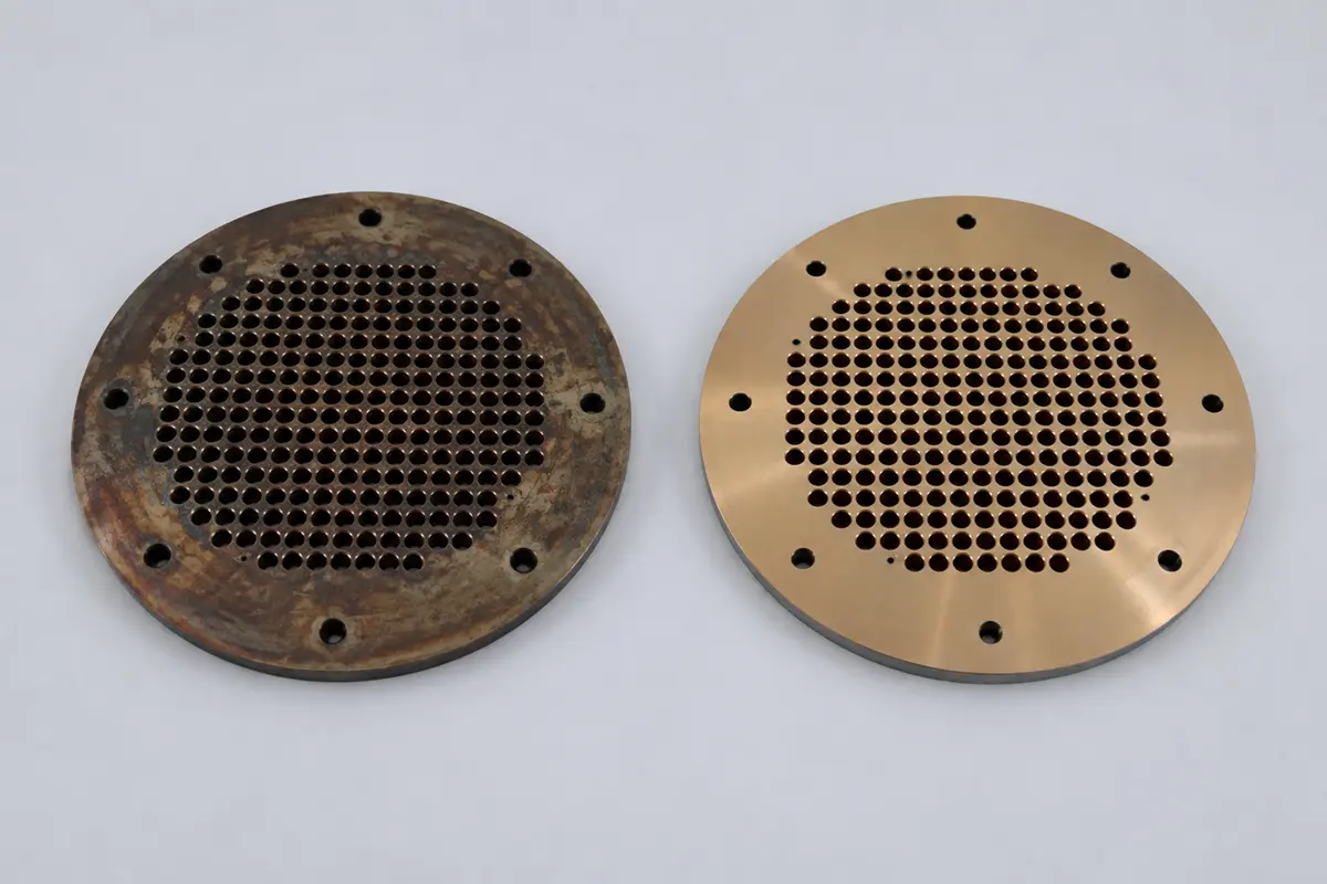 Oxidized and restored copper alloy perforated plates appearance is visible