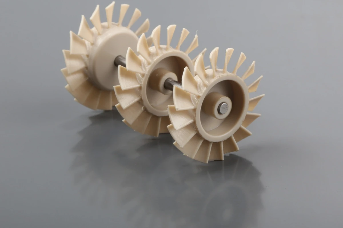 PEEK machined gears and impeller components for wear-resistant precision assemblies.