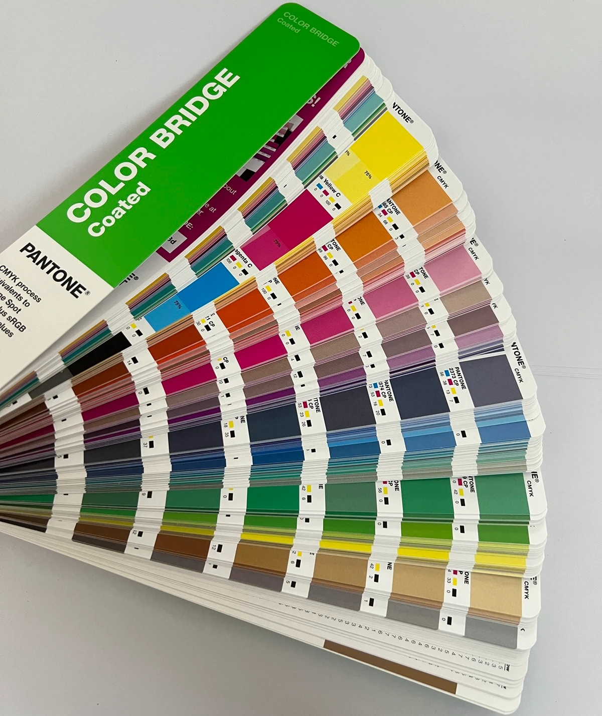 Pantone Color Bridge fan deck used as a visual reference for custom anodized aluminum color targeting