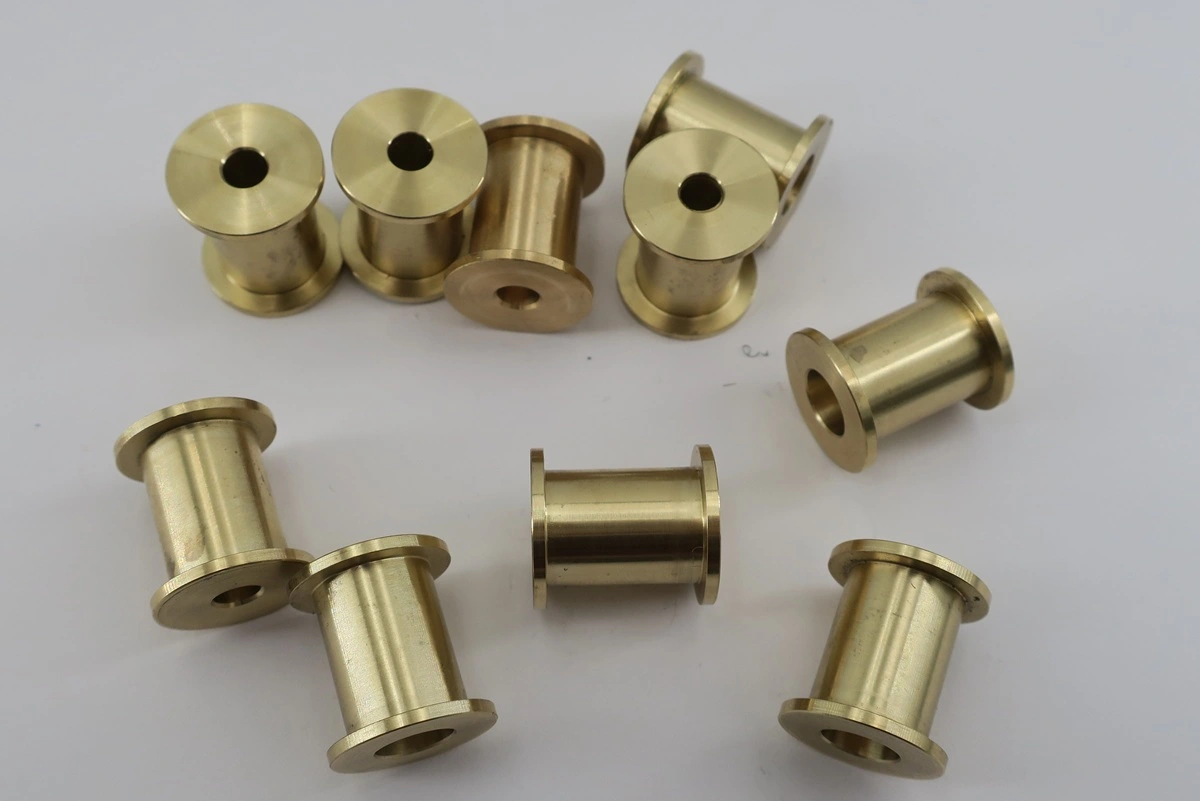 Precision machined brass spool components