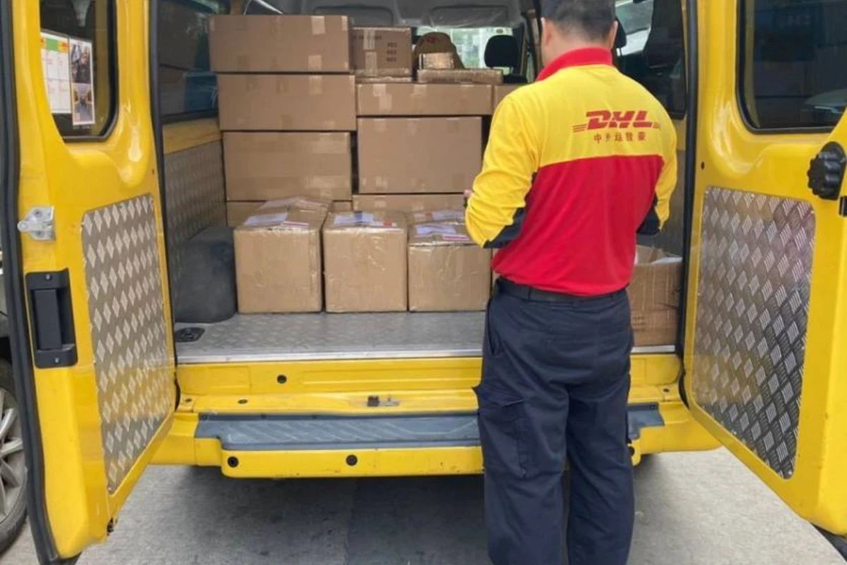 Sealed cartons loaded for international express shipment after final packaging inspection
