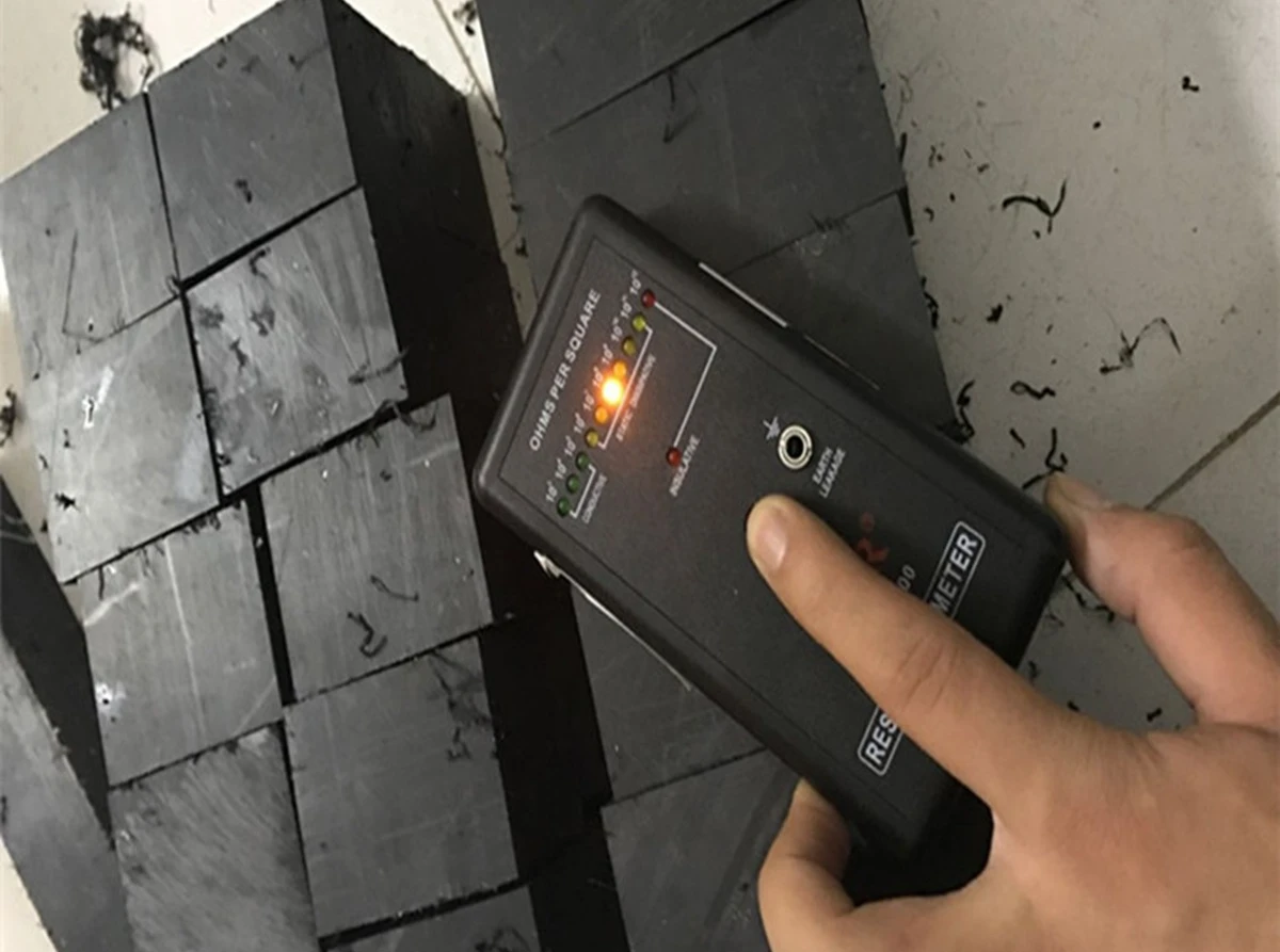 Surface resistivity testing of black ESD UHMW polyethylene stock using a handheld resistivity meter