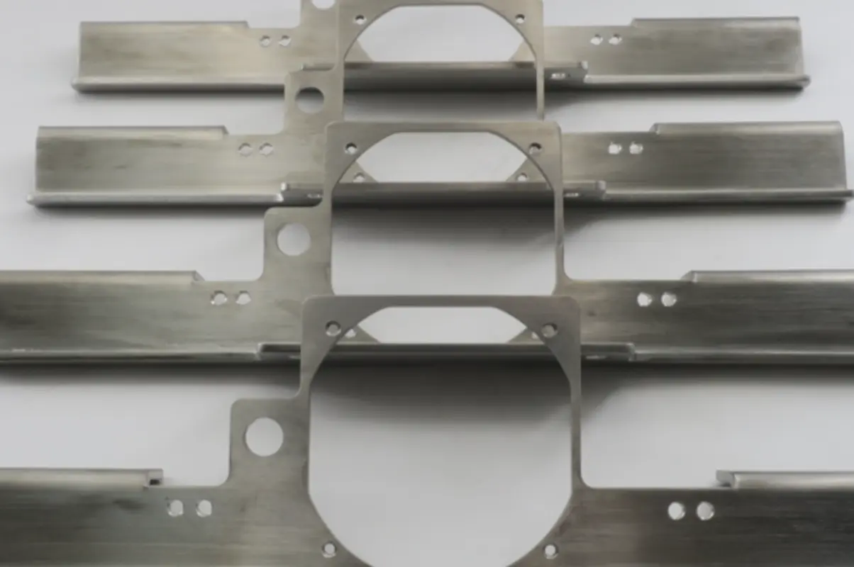 Bent brackets with precise hole locations
