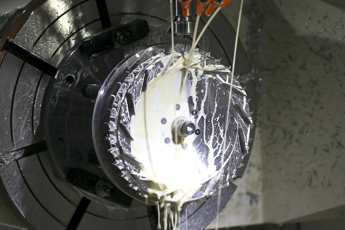 CNC fixture providing tool access during machining