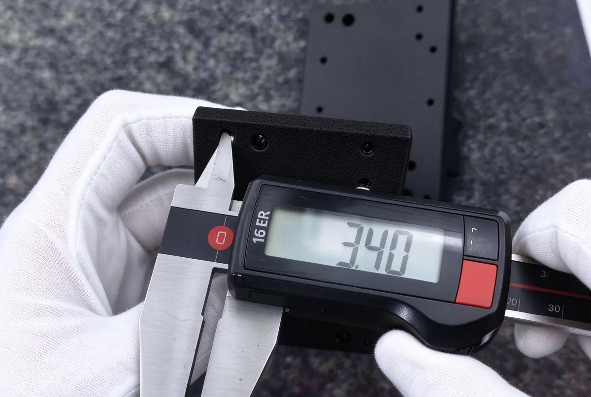 Measuring sheet metal tab with digital caliper