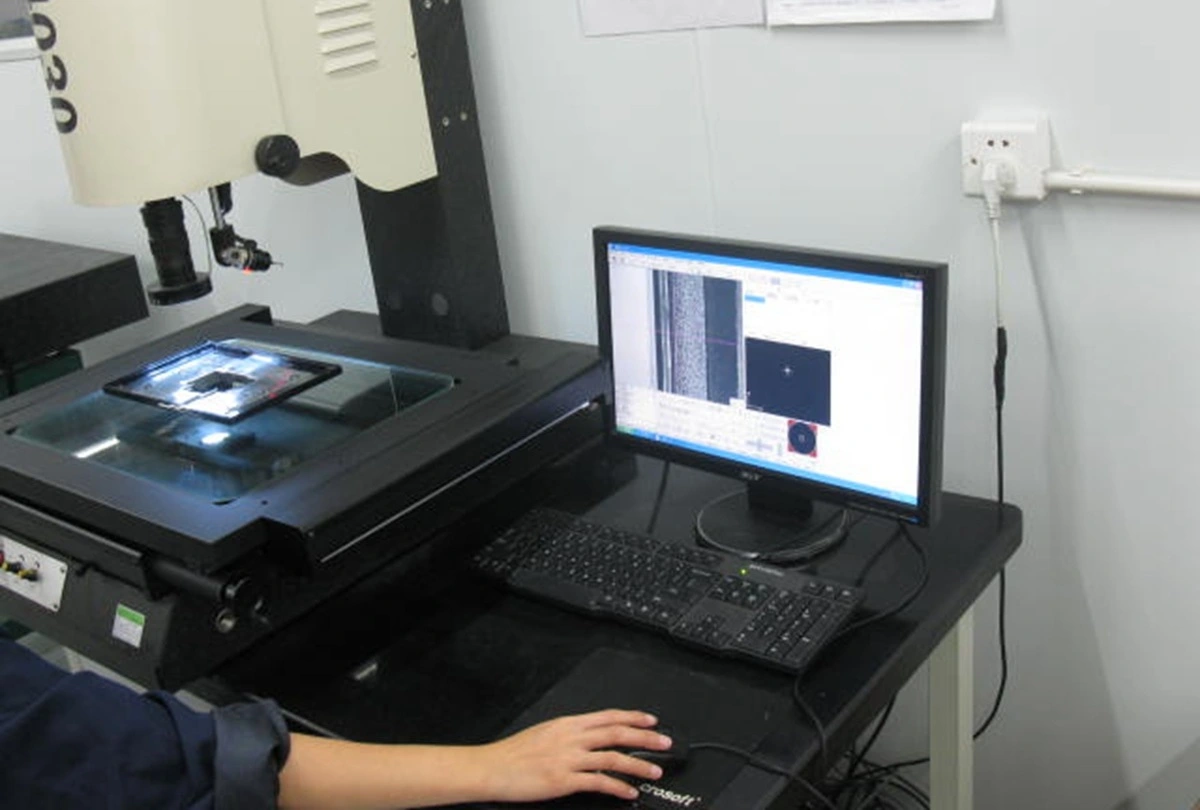 Optical inspection of precision sheet metal
