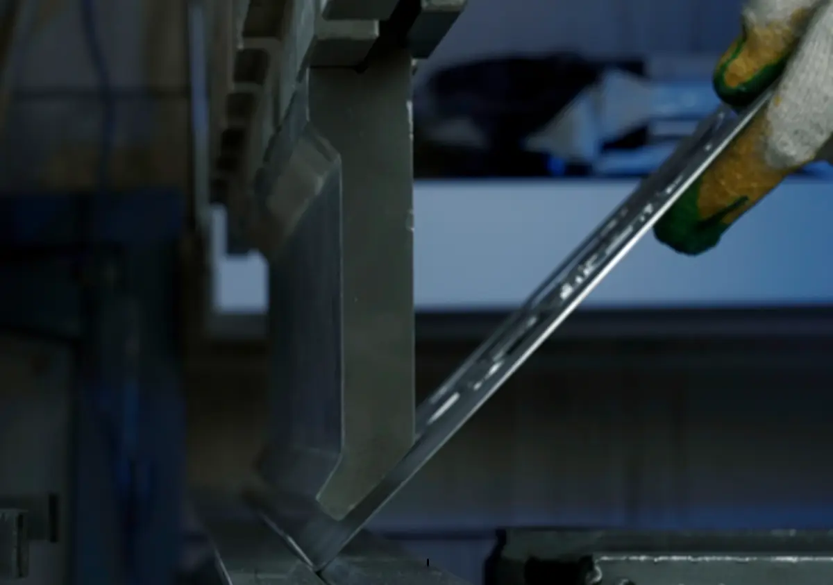 Sheet metal bending with a press brake