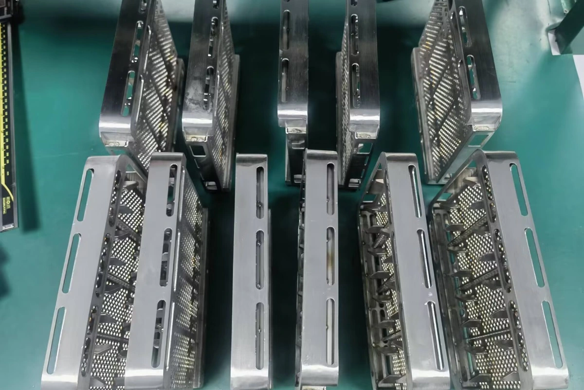 Batch of assembled stainless metal trays