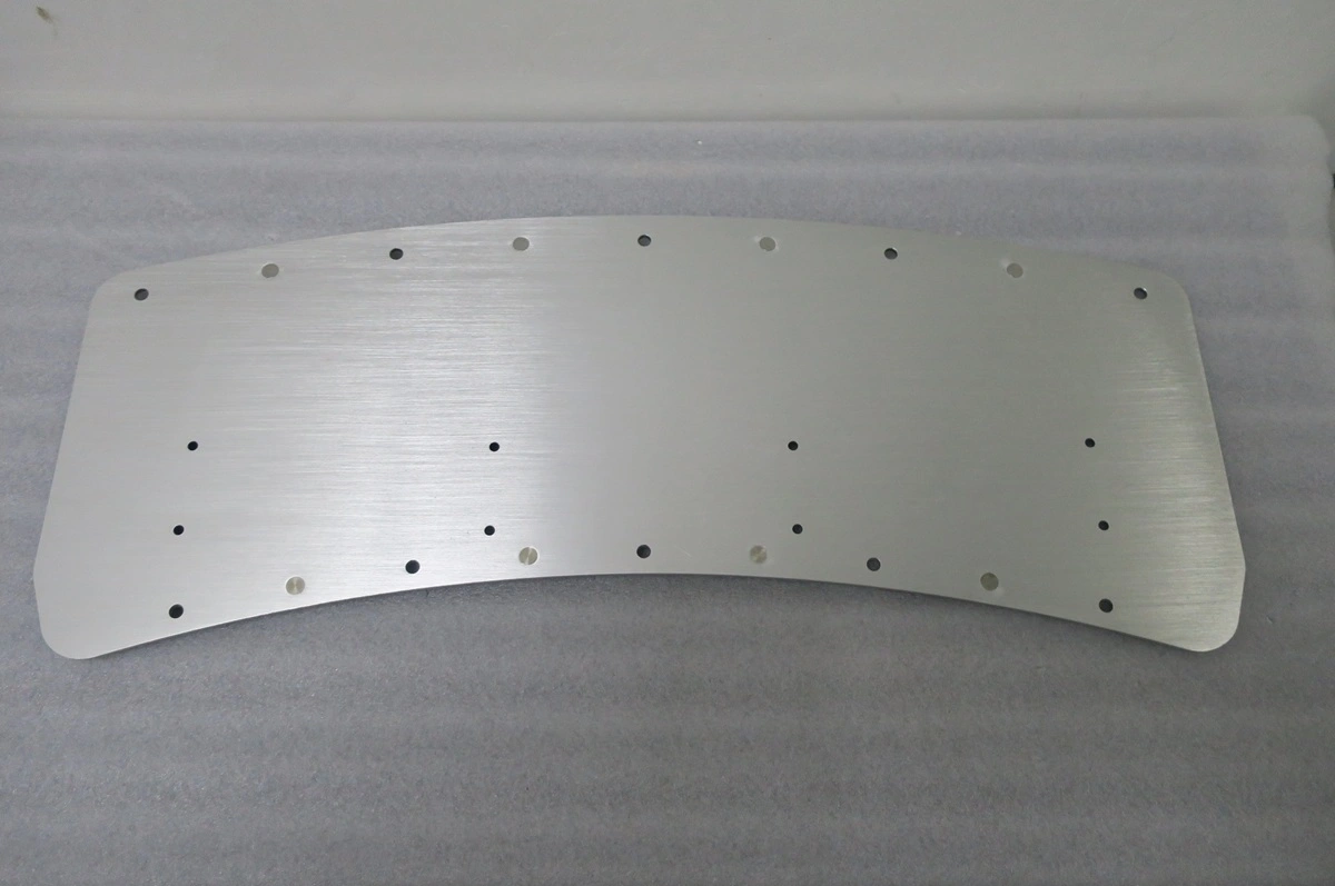 Brushed aluminum mounting plate with holes
