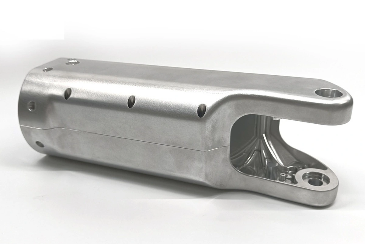 Machined gripper component with extended geometry