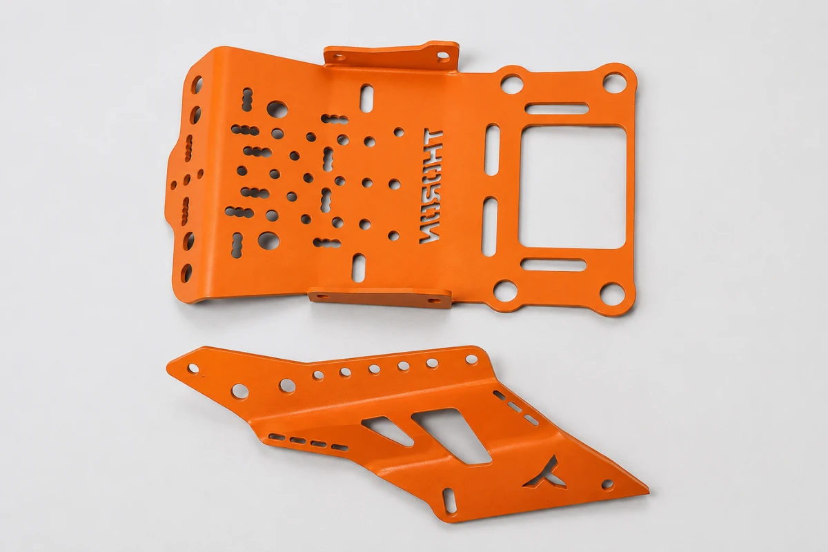 Orange powder coated sheet metal brackets