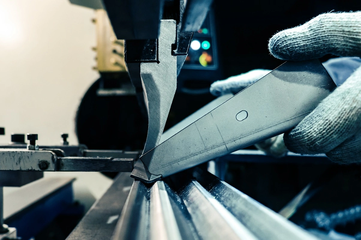 Press brake tooling during sheet metal bending