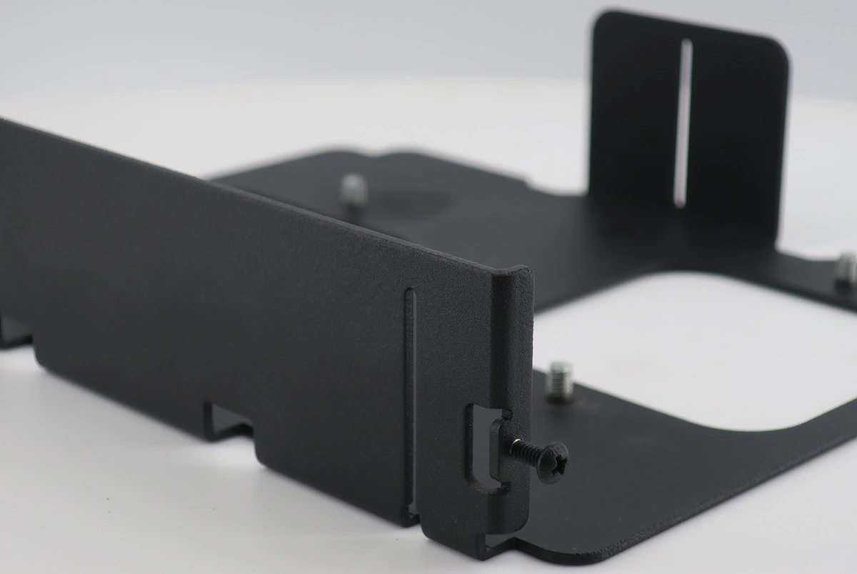 Sheet metal bracket with mounting slots and fastener